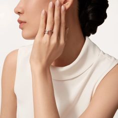 Elevate your style with the JUSTE RING 2.65MM in sleek silver. This elegant piece adds a touch of sophistication to any outfit, making it the perfect accessory for any occasion. Its understated yet refined design is sure to make a statement and impress all who see it. Embrace luxury and elevate your look with the JUSTE RING. ADDITIONAL INFORMATION Color: Silver Stone : No REF.: B4216900 Material:- 925 Sterling Silver - 18k Gold Plated- 18k Real Gold ( contact us via instagram) Width: 2.65 mm Rin Timeless White Gold Pearl Ring With Diamond Accents, Cartier Rose Gold Wedding Ring, Classic Diamond White Open Ring Jewelry, Luxury Pearl Ring With Diamond Accents For Promise, Classic Open Ring In Diamond White, Classic Open Ring In Diamond White Color, Elegant Diamond Pearl Promise Ring, Elegant Diamond Pearl Ring For Promise, Cartier White Gold Diamond Ring Vs Clarity