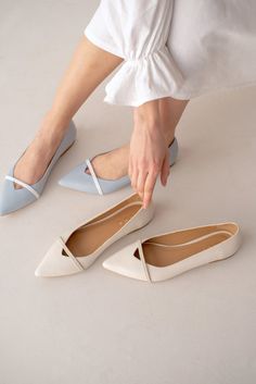 "LINES ballet flats with a pointed toe made from smooth Italian leather. Women's pointy shoes have a V-cut in the toe area, along which a strip of off-white leather runs. This design covers the toes but allows for a V-notches vamp. This \"not boring\" classic will perfectly complement any look. Cushioned insoles along the entire shoe length are soft and remember the foot's position. Tunit sole is a mixture of leather chips and rubber, and it's more wear-resistant than leather and more durable. A Flat Women Shoes, Shoes Everyday, Bridesmaids Shoes, White Flat Shoes, Pointy Shoes, Bridal Flats, Wedding Shoes Flats, Wedding Flats, Pointy Toe Flats