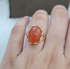 This Ring comes with a 100% Natural Carnelian Gemstone and it is made up of 925 solid sterling silver. This ring is handcrafted by our skilled craftsmen and designed by us. Every gemstone is handpicked for the best quality. Materials:- Silver (925 Solid Sterling Silver) Gemstone:- Natural Carnelian. Item Weight :- approx. 4 Grams Stone Weight :- 10 CTS Stone Size :- 12x16 MM Stone Shape :-  Oval Cab Select Size in Variation , if you don't find perfect size please buy any size and message us your Middle Finger Ring, Carnelian Ring, Wedding Bridal Jewellery, Ring Finger, Sterling Silber, Ring Gift, Wedding Rings Engagement, Wedding Jewelry, Gifts For Women