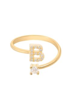 Design: This simple but beautifully styled initial letter ring is perfect for those who covet delicate jewellery with a hint of sparkle offering a sophisticated finishing touch to any outfit. Pretty and petite, this initial ring features an open band, which allows for slight adjustability with sizing. The opening is designed to be on top of your finger, where your zircon adorned monogram is on one side and a single larger cubic zirconia resides on the other. What can be more personal than a name Initial Ring Gold, Gold Initial Ring, Delicate Jewellery, Gemstone Earrings Gold, Gemstone Drop Earrings, Zierlicher Ring, Letter Ring, Writing Gifts, Mother Of Pearl Necklace