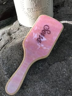 Custom Pink Paddle Brush,Personalised Hairbrush,Engraved Detangling Hairbrush,Bridesmaid gift,Birthday Gift for Teenage Girl These Hairbrush are the perfect-little-special something to celebrate a BFF's birthday, bridesmaid proposal gift, for the bride-to-be, a new mom, a sister or niece, teacher appreciation, or just a way to add some sparkle to your daily life! Hairbrush are made by hand, so please allow 7-10 days for your order to be made, packaged, and shipped! *ALL ITEMS SHIP WITH USPS PRIORITY 1-3 DAY DELIVERY (you will automatically receive tracking number information once your item ships Since these products are custom in nature, we are not able to offer returns or exchanges! However, your satisfaction is our first priority so please feel free to contact me about your order at any Bedazzled Hair Brush, Pretty Hair Brush, Personalised Hair Brush, Custom Hair Brush, Pink Hairbrush, Gift Ideas Sister, Gift For Teenage Girl, School Bag Essentials, Bff Birthday