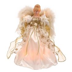 an angel figurine with two candles in its hands