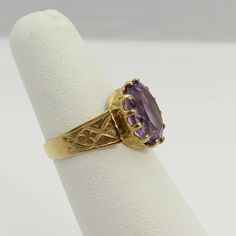 Estate 14k yellow gold large amethyst ring size 4.5. a 11mm by 10mm amethyst stone. great shape. no chips or damage. 2.8 grams. good size cocktail ring. Antique 14k Gold Amethyst Ring, Victorian Gold Oval Amethyst Ring, Victorian Gold Amethyst Ring In 14k Gold, Hallmarked 14k Gold Oval Amethyst Ring, Collectible Oval Amethyst Ring In 14k Gold, Heirloom Yellow Gold Oval Amethyst Ring, Collectible Yellow Gold Birthstone Rings, Yellow Gold Rings With Birthstone, Heirloom Hallmarked Yellow Gold Birthstone Ring