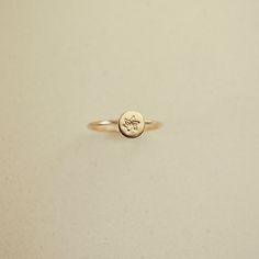 Embrace timeless elegance with our Birth Flower Ring, where traditional charm meets personalized flair. Crafted in 14k gold filled, this meaningful piece can be tailored with a hand-stamped birth flower. Carry a token of cherished memories with you wherever you wander, securely encircling your finger. Handcrafted in the U.S.A Details Hypoallergenic, Water Resistant, Tarnish-free Material : 14k Gold Filled Flower Stamp 4mm Note: If your size is a half ex: 5 1/2, leave us a note at the cart reques 40th Gifts, 20 Gifts, Flower Stamp, Beaded Cuff, 30 Gifts, Birth Flower, Birth Flowers, Cherished Memories, Chain Choker