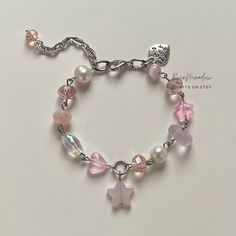 Wired Beaded Bracelets, Cheap Pink Beaded Bracelets For Valentine's Day, Bead Bracelet Inspiration, Cute Pink Glasses, Pink Beads Bracelets, Pink Pearl Beaded Bracelets For Jewelry Making, Pink Pearl Charm Bracelet, Cute Pink Accessories, Bracelet Handmade