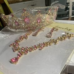 the tiara and earrings are on display