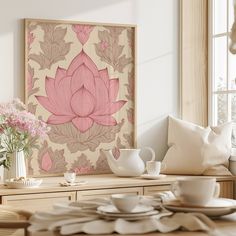 a table with plates, cups and vases on it in front of a painting