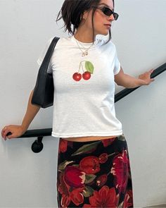 Our retro inspired cherry tee is perfect for casual summer outfits! All of our baby tees are digitally printed on 100% cotton and shrunken for a 90s style baby tee look. Pair with high waisted vintage levis for a casual look or with a vintage printed midi skirt for a casual evening outfit!  🍒 DETAILS 100% cotton Youth tees - these are small, shrunken t-shirts, not crop tops! Unisex Lightweight DTG - digitally printed  Ribbed collar Shoulder-to-shoulder taping Tubular seam construction Blank tee Trendy Crew Neck T-shirt With Cherry Print, Y2k Style Short Sleeve T-shirt With Fruit Print, Retro Cherry Print T-shirt For Summer, Fitted Cotton T-shirt With Cherry Print, Y2k Cherry Print Summer Tops, Fitted Summer T-shirt With Strawberry Print, Fitted Strawberry Print T-shirt For Summer, Trendy Summer Tops With Cherry Print, Fitted Cherry Print T-shirt For Summer