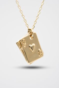 Play Card Gold Necklace, There are some jewelries that change your life the moment you wear them, this design may be one of them. Luck is always on your side with this gold necklace. The value of a jewelry consists of numbers. It will be priceless once you get it.☙ MATERIAL : 14K Gold. WEIGHT : 2,66 Grams COLORS : Gold - White - Rose Gold Each item is made to order. It is definitely not gold plated. Real 100% 14K Gold. There may be 10% -) deviation margin in the products. You can do product main Elegant Necklace With Message Card For Anniversary, Valentine's Day Anniversary Jewelry With Message Card, Elegant Necklaces For Anniversary Gift With Message Card, Elegant Mother's Day Jewelry With Message Card, Hallmark Charm Necklaces For Valentine's Day Gift, Hallmarked Charm Necklaces For Valentine's Day Gift, Valentine's Day Gift Charm Necklaces With Hallmark, Valentine's Day Hallmarked Charm Necklaces As Gifts, Elegant Valentine's Day Necklace With Message Card