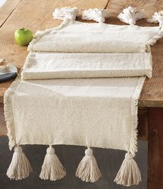 the table is covered with three tassels