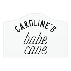 a white sign with black lettering that says carolina's babe cave on the front