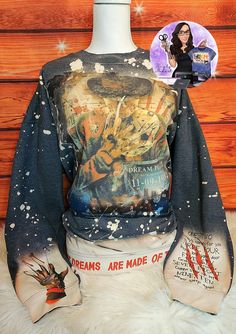 Scary Sweatshirt, Freddy Krueger Crew Neck Sweater, Bleached Sweater, Custom Halloween Sweater, Halloween Sweatshirt, Horror Sweatshirt Handmade, custom in a small Pennsylvania town.  All items are handmade with love 💗Custom Bleached, Super comfortable Gilden Softstyle sweatshirt. Sublimation printed design. Bleach pattern may vary.  Please see the sizing chart pictured above or message us with sizing questions.  We unfortunately do not accept returns due to the custom made nature of the shop, but if there is an issue with your purchase, please feel free to contact me and we will do the best we can to help. Bleached Sweater, Freddy Krueger Sweater, Horror Sweatshirt, Bleached Tees, Halloween Sweater, Ghost Faces, Freddy Krueger, Halloween Sweatshirt, Clothing Ideas