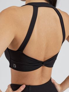 Features: Twist front detailing Back twist detailing V-neckline Halter detail Removable bust pads Details: Fabric: Butter (Nylon/Spandex) Light Support Level Description: The Twisted Sports Bra is a shortline sports bra with V-shaped neckline that’s sure to highlight all your best features. It features a front and back twist detail and a halter strap detail for a chic look. It is made with our Butter fabric for a soft, buttery feel with great flexibility. Activewear Details, Pole Clothes, Sports Bra Design, Double Twist, Underwire Sports Bras, Sports Wear Women, Twist Styles, Set Outfits, High Impact Sports Bra