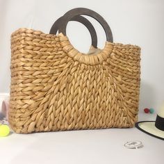 Rattan Liesure Bag has a bamboo handle and a polyester cotton inner lining bamboo handle Size: Upper mouth width 42cm, bag height 25cm, total height 35cm (including handle), bag thickness 12cm Leisure Wear Women, Bag Picture, Bamboo Bag, Corn Husk, Briefcase For Men, Vegan Leather Bag, Style Women, Womens Crossbody Bag, Woven Bag