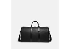 Gotham Duffle | COACH® Classic Formal Bags With Leather Trim, Coach Business Bag With Zipper Closure, Elegant Textured Leather Duffle Bag For Business Trips, Leather Bags With Leather Trim For Business Trips, Modern Leather Duffle Bag For Formal Occasions, Elegant Textured Leather Business Duffle Bag, Elegant Textured Leather Duffle Bag, Elegant Business Duffle Bag With Textured Leather, Formal Textured Leather Duffle Bag