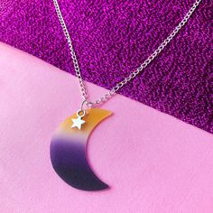 Non binary pride flag Shrinky dink crescent moon necklace.Non binary flag colours are blended subtly to create a gorgeous crescent moon charm then assembled with a silver star charm onto a necklace chain. Perfect subtle necklace to wear to show your Enby pride or an ideal coming out gift for your non binary friends or family members.Moon charm is approx 3.5cmThe moon charm is available on silver colour alloy metal chain, gold colour alloy metal, (not real silver or gold - may tarnish after frequent wear) or stainless steel chain which will never tarnish. The other jewellery findings will still be alloy metal.Please select which length you would like your necklace at checkout:.16" inches18" inches20" inches22" inches24" inchesIf there is a length of this necklace or a pride flag you would l Non Binary Flag, Non-binary Flag, Non Binary Pride, Pride Flag Colors, Astrology Jewelry, Shrinky Dink, Non Binary, Crescent Moon Necklace, Gold Alloys