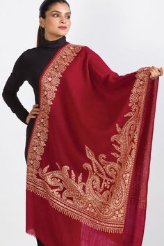 Our Geeta Embroidered Shawl features exquisite embroidery on soft 100% merino wool. With a stunning contemporary design, this classically beautiful shawl showcases the intricate embroidery traditions of Northern India in a range of jewel tones.  The high quality and elegance of our embroidered shawls make them treasures that will last for generations.  -------------------------------- Material: 100% Merino Wool Shape: Rectangle Care: Hand Wash with Gentle Detergent, Hang to Dry Dimensions: 28" x Luxury Handloom Traditional Drape Shawl, Luxury Traditional Shawl Scarf, Luxury Elegant Shawl With Intricate Embroidery, Luxury Jamawar Pashmina Shawl For Traditional Ceremonies, Luxury Semi-stitched Handloom Shawl, Luxury Elegant Embroidered Pashmina Fabric, Luxury Dupatta Shawl With Motifs, Luxury Handmade Shawl For Gift, Elegant Chikankari Embroidery Scarf In Traditional Drape