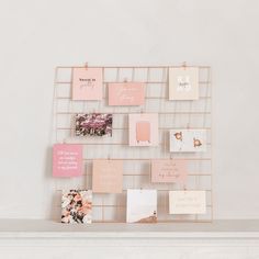 a wall mounted with many different types of greeting cards and magnets on it's sides