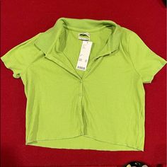 Brand New With Tags. In Style. Fitted Urban Outfitters Top With Button Closure, Trendy Urban Outfitters Tops With Buttons, Urban Outfitters Summer Button-up Tops, Urban Outfitters Button-up Summer Tops, Trendy Green Top From Urban Outfitters, Trendy Green Top With Button Closure, Basic Button-up Spring Tops, Trendy Green Tops With Button Closure, Basic Tops With Button Closure For Summer