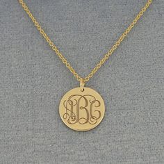 "*Disc Circle Size : 1/2 Inch (1.2 cm) X 1/2 Inch (1.2 cm). *Pendant Thickness: 0.7 mm / 22 Gauges / 0.028\". *Metal : 10kt or 14kt Solid White or Yellow Gold. *Chain : Optional (1.0 mm (Gauge 25) Rollo chain 16, 18 or 20 inch). *Premium high end quality fine solid 10kt or 14kt yellow or white gold with high polished finish and deeply engraved 3 initial monogram and cut out by latest technology laser machine, top quality guaranteed. *Made in USA, ships from Los Angeles CA, USA. *These monogram j Gold Name Necklace With Round Pendant For Anniversary, Anniversary Jewelry With Initial Pendant Hallmarks, Engraved Yellow Gold Brass Jewelry, Elegant Gold Monogram Necklace, Classic Gold Monogram Jewelry, Formal 14k Gold Monogram Necklace, Formal Monogram 14k Gold Necklace, Classic Personalized Gold-tone Jewelry, Personalized Classic Gold-tone Jewelry