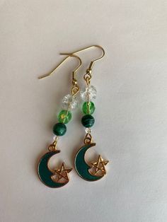 These earrings are made with Preciosa crystal and malachite beads with gold enameled crescent moon & star charms.  Gold finished stainless steel ear wires come with rubber earring backs. Dnd Fairy, Gold Crescent Moon, Malachite Earrings, Celestial Earrings, Crescent Moon Earrings, Pretty Jewelry, Moon Star, Moon Earrings, Gold Enamel