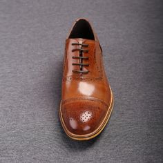 Brown Oxford shoes are life-savers of a sort because they can be worn with almost anything! Since these are high-quality ones, you can rest assured they will go equally well with jeans and tweed. This pair will be a great addition to any unique shoe collection. These oxfords can be worn with 2- and 3-piece business suits and casual suits, whatever suits your taste! Suits with bold patterns and material blends will also be perfect with these shoes. No matter which color suit you are wearing, these shoes go along with every shade. Be it grey, dark brown, or navy colored suits. In fact, many style experts prefer them over wearing black due to their far more visually striking effect. The shoes are constructed from 100% Genuine Leather for maximum durability The only premium quality leather is Unique Shoe, Brown Oxford Shoes, Black Boots Men, Leather Formal Shoes, Oxford Brogues, Brown Oxfords, Bit Loafers, Suede Leather Shoes, Genuine Leather Boots