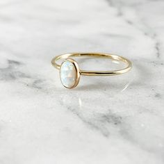 Gold Filled Opal Gemstone Oval Ring  (October Birthstone Teal White Pink Purple Blue Hammered Smooth Adjustable Oval Opal Ring Minimalist Style, Minimalist Oval Opal Ring For Gift, Minimalist Oval Opal Ring Gift, Minimalist Adjustable Oval Opal Ring, Minimalist Everyday Opal Jewelry, Oval Opal Stackable Jewelry, Modern Oval Cabochon Opal Ring As Gift, Stackable Oval Opal Jewelry, Stackable Oval Opal Rings