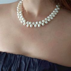 A wide chain with a double strand of pearls. A necklace with a special shape of freshwater pearls. A necklace that suits the classic woman who also likes special jewelry. A large and special pearl necklace for a woman. These pearls are drilled and strung in a special way to have a delicate vining pattern. (Pearls will have to be flipped over once the bracelet is put on so that every other one goes one way and every other goes the other. Some of them will lay down correctly, naturally. Size: 41 c Pearl White Multi-strand Pearl Chain Necklaces, White Gold-plated Pearl Necklace With Adjustable Chain, Hand-strung Pearl White Pearl Necklace, Pearl White Baroque Pearl Choker, Pearl White Multi-strand Pearl Necklace, Large Pearl Necklace, Real Pearl Necklace, Pearl Choker Necklace, Freshwater Pearl Necklace