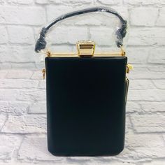 Nwt Vegan Jewel Top Crossbody Satchel Bag Boutique Brand! Brand New! Color: Black Material: Vegan Faux Leather Measurements: Bag: 8x7 Handle: 12 Inches Note: Comes With An Strap Located Inside Bag Black Rectangular Clutch With Top Carry Handle, Black Pouch Box Bag With Top Carry Handle, Black Square Evening Bag With Detachable Strap, Black Square Satchel For Evening, Chic Formal Phone Pouch Bag, Evening Shoulder Bag For Mobile Phone, Chic Mobile Phone Bag For Night Out, Evening Clutch Phone Bag With Removable Pouch, Chic Crossbody Phone Bag For Party