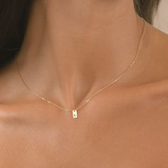 Elevate your everyday style with our exquisite Initial Tag Necklace, available in 14k gold filled, sterling silver, or 14k rose gold filled options. Personalize your look with your choice of initials, beautifully crafted into a sleek and modern tag pendant. Handcrafted with care, this necklace is perfect for adding a touch of elegance to any outfit, whether you're dressing up for a special occasion or adding a chic accent to your casual wear. Each necklace comes with a delicate chain that comple Dainty Gold Initial Necklace, A Necklace Initial, Minimalist 14k Gold Filled Birth Flower Jewelry, Minimalist 14k Gold Filled Initial Necklace Gift, Minimalist 14k Gold Jewelry With Birth Flower, Minimalist 14k Gold Filled Jewelry As Gift For Mom, Dainty 14k Gold Filled Initial Necklace Gift, Minimalist 14k Gold Filled Jewelry For Mom, Simple 14k Gold Filled Necklaces For Gifts