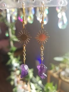 These Sunburst Amethyst earrings are the perfect addition to your crystal jewelry collection! They're super lightweight making them easy to wear all day. The perfect Birthday or Anniversary gift for the witchy woman in your life! Handmade with high quality, hypoallergenic and nickel free findings. Wanna show off your new earrings? We'd love to see you strutting your stuff  with your new  earrings so be sure to tag us with @prairiesunshowers on Instagram/Facebook and TikTok to share the love❤ Tha Sun And Moon Design Spiritual Earrings As Gift, Handmade Celestial Crystal Earrings For Gift, Mystical Sun And Moon Earrings As Gift, Spiritual Sun And Moon Dangle Earrings, Spiritual Amethyst Wire Wrapped Earrings, Handmade Mystical Earrings For Gift, Adjustable Spiritual Earrings With Sun And Moon Design, Adjustable Spiritual Sun And Moon Earrings, Adjustable Sun And Moon Spiritual Earrings