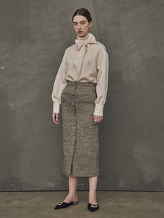 Editor's NotesLuxurious feminine mood tweed material skirt with a stylish silhouette that is great to style both formally and casually. It is great to style in a luxurious ways with various of blouse tops.- Long length pencil skirt- Unique linen material summer wear- Elegant and luxurious wear- Great to style with same material tweed jacketMeasurements(in.)S / M- Total Length: 33.07 in. / 33.46 in. - Waist: 12.60 in. / 13.58 in.- Hip: 17.13 Chic Fall Evening Pencil Skirt, Chic Evening Pencil Skirt For Fall, Classic Tweed Skirt For Work, Elegant Semi-formal Fall Skirt, Elegant Fall Office Skirt, Formal Fall Tweed Skirt, Fall Beige Tweed Skirt, Formal Tweed Skirt For Fall, Elegant Tweed Skirt For Fall