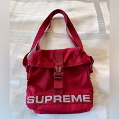 Nwt Supreme Red Side Bag Designer Large Capacity Red Shoulder Bag, Designer Red Shoulder Bag With Large Capacity, Luxury Large Capacity Red Shoulder Bag, Designer Red Pouch Satchel, Designer Rectangular Red Bag, Designer Red Shoulder Bag For Travel, Luxury Red Bags For Everyday Use, Designer Red Rectangular Bucket Bag, Red Functional Shoulder Bag With Removable Pouch