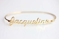 Jacqueline Name Bracelet, Name Bracelet Gold, Jacqueline Name Jewelry, Name Plate Jewelry Gold Personalized Vintage Bracelet Jewelry, Vintage Jubilee Bangle As Gift, Vintage Gold Personalized Bracelets, Personalized Vintage Gold Bracelets, Retro Bangle Bracelets For Gifts, Retro Bangle Bracelets For Gift, Retro Gold Bracelets As Gift, Retro Adjustable Bracelets For Wedding, Retro Gold Cuff Bracelet As A Gift