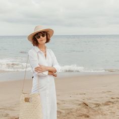 The Salty, our handwoven straw tote bag, embodies the California state of mind - effortless beach style and functional sustainability. Worn over the shoulder, as a crossbody, or styled for a dressier occasion as a straw handbag, the removable leather strap makes the Salty tote your most versatile accessory for summer. The hand-dyed, 100% genuine leather strap and handles in our signature 'salt,' neutral tone and matte gold hardware elevate the Salty straw bag for a chic coastal look. Each handmade bag is unique and may have small imperfections or vary in size and color. All Leah products are responsibly sourced and ethically crafted. 14 x 4.5 x 16 in Imported Spring Travel Crossbody Straw Bag, Chic Summer Straw Bag In Natural Fiber, Elegant Straw Tote Bag For The Beach, Elegant Tote Straw Bag For The Beach, Elegant Beach Bag With Leather Handles For Vacation, Chic Spring Beach Bag In Natural Fiber, Chic Straw Bag With Adjustable Strap For Travel, Natural Straw Bag For Beach Day Out, Natural Straw Bag For Day Out In Beach Season