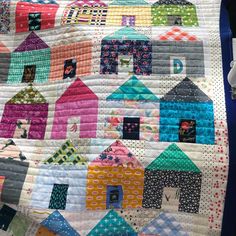 a quilt made to look like houses