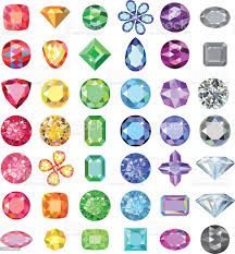 many different colored diamonds and gems on a white background