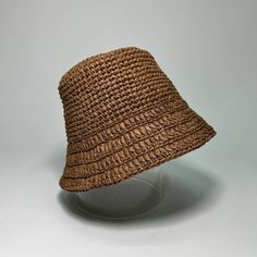 This hat is made of raffia. Raffia is palm leaves. Also, in this hat you will not be hot even on a summer day, because it is made of natural raw materials. Panama is made in boho style - you will be in trend! Suitable for head size 55-56 cm. Casual Woven Straw Hat With Short Brim, Brimmed Woven Toquilla Straw Bucket Hat, Woven Toquilla Straw Bucket Hat With Curved Brim, Bohemian Fedora Straw Hat For Warm Weather, Natural Woven Wide Brim Bucket Hat, Wide Brim Natural Woven Bucket Hat, Natural Wide Brim Toquilla Straw Bucket Hat, Wide Brim Woven Bucket Hat In Natural, Summer Hats With Open Weave And Flat Brim