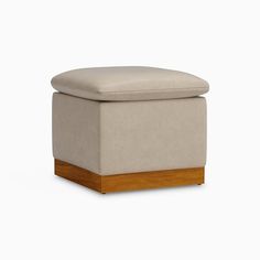 the foot stool is made from wood and fabric