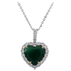 Lovely emerald and diamond drop necklace, GIA certified. By Alexander Beverly Hills. 5.60 carats total gemstone weight. 4.58 carat heart emerald, F3, GIA certified. 21 round brilliant diamonds, 1.02 carats. Approximately F color and VS clarity. 18-karat white gold, 3.78 grams, 16in. Accommodated with an up-to-date digital appraisal by a GIA G.G. once purchased, upon request. Please contact us with any questions. Item Number PS1550 Modern Diamond Jewelry, Emerald Pendant Necklace, Diamond Drop Necklace, Emerald Necklace Pendant, Modern Jewellery Design, Diamond Heart Pendant Necklace, Contemporary Jewelry Design, Colorless Diamond, Emerald Pendant