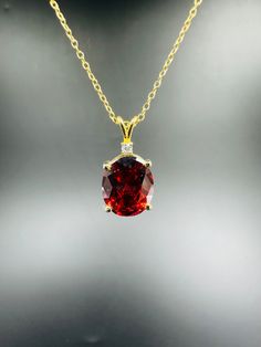 Oval Cut Red Garnet Diamond , 14k Yellow Gold Plated , Garnet pendant necklace ,Minimalist Necklace, Women's Necklace, Christmas Gift Material: High Quality Solid 925 Sterling Silver * Finish: Sterling Silver ∙ 14K Gold * I N F O R M A T I O N * Every item is tastefully wrapped and presented in lovely jewellery boxes. Reusable and biodegradable, our jewellery boxes * Are you interested in your own design or looking for advice? Do not hesitate to contact us! We take pride in our quick response times and are ready to help you. SHIPPING TIME * 3 TO 5 Business Days With USPS Priority Mail CHECKOUT OUR STORE FOR NEW EXCLUSIVE DESIGN: https://garnetcreationdesign.etsy.com Thank you immensely for choosing to visit our store, and we sincerely hope that your shopping experience with us surpasses yo Luxury Garnet Necklace For Anniversary, Classic Red 14k Gold Necklace, Classic Red Pendant Necklace, Red Gemstone Pendant Necklace, Red Gemstone Pendant Necklaces, Red Oval Diamond Cut Necklace, Yellow Gold Garnet Necklaces With Oval Shape, Fine Jewelry Garnet Necklace As Gift, Red Garnet Oval Pendant Necklace