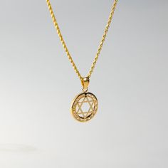 Fall in love with its captivating symmetry. This 14K solid gold handmade star of David pendant is a must-have for anyone who pays attention to even the smallest of details. A quick inspection of the piece will make you admire over the 30 years of experience we bring with every handcrafted pendant we make. This one is no exception as the edges, the points, and its overall appeal genuinely captures the aura of one of the most popular Jewish symbols. Send it as a gift or add it to your collection o Gold Sterling Silver Star Of David Necklace, Star Of David Yellow Gold Plated Jewelry, Spiritual Yellow Gold Necklace With Star Charm, Gold Star-shaped Jewelry With Diamond Cut, Gold Star-shaped Diamond Cut Jewelry, Gold Star Of David Spiritual Necklace, Spiritual Yellow Gold Star Jewelry, Spiritual Yellow Gold Star Of David Necklace, Gold Star Of David Jewelry For Anniversary