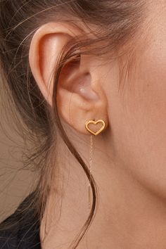 These gorgeous heart-shaped earrings come with delicate chains to dress up your ears. With beautiful outline hearts, these drop earrings are a must-have for your jewelry collection. HEART*DROP*EARRINGS ‣ 2 Years Warranty ‣ Free Express International Shipping ‣ Free returns within 30 days from the order date Features * Made to Order. * Material: Solid Gold (real solid gold, no gold-filled or no gold plated material) * Gold KT: 14K * Available Gold Color: Yellow Gold, Rose Gold, White Gold * Ready Elegant 14k Gold Filled Earrings With Heart Charm, Elegant 14k Gold-filled Heart Earrings, Delicate Gold Earrings With Heart Charm, Dainty Drop Earrings For Valentine's Day, Elegant 14k Gold Filled Heart Earrings, Rose Gold Ear Wire Jewelry For Valentine's Day, Elegant 14k Gold Filled Earrings For Valentine's Day, Dainty Rose Gold Heart Dangle Earrings, Elegant Single Heart Cut Earring