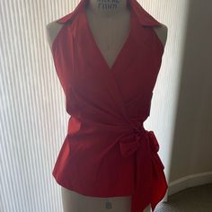 Beautiful Cotton With A Little Stretch Red Halter Blouse. Wrap Style That Ties In Front. Size 10 But Fits Size 8 Dress Form Well. Purchased Years Ago But Never Worn. Still Has Tags. Elegant Red V-neck Blouse, Red V-neck Top For Office, Elegant Red Office Tops, Elegant Fitted Red Top, Formal Cotton V-neck Blouse, Elegant Red V-neck Tops, Chic Red Blouse For Work, Red Sleeveless Formal Tops, Chic Red V-neck Blouse