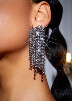 Experience elegance and glamour with our Zinc Alloy Rhinestone Tassel Earrings. Made with top-quality zinc alloy and adorned with sparkling rhinestones, these earrings are perfect for any special occasion or adding a touch of luxury to your everyday look. The tassel design adds a touch of movement and sophistication. Material: Zinc Alloy * Return and exchange are not supported Trendy Crystal Earrings For Evening, Trendy Evening Crystal Earrings, Glamorous Alloy Jewelry For Party, Glamorous Alloy Party Jewelry, Crystal Chandelier Earrings With Rhinestone Fringe, Trendy Crystal Earrings For Party, Silver Tassel Earrings With Rhinestone Fringe, Dangle Crystal Earrings With Rhinestone Fringe, Silver Crystal Dangle Tassel Earrings