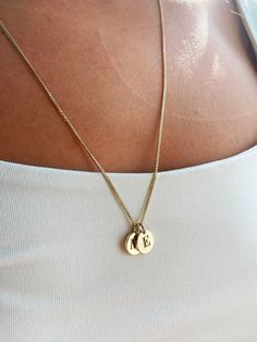 This 14k gold disk necklace is made of real 14k Solid Gold. We can produce this engraved small disc necklace in White or Rose Gold too, please add to order notes. You can add as much as disks you want to this disks addable chain, all you need to choose from the options. Logo engraved charm is solid, not hollow. Chain and discs are thick, solid and high quality. Necklace on pictures is 6,6 gr. Necklace on pictures is 23,62 inch length, with 2 discs. We can engrave on discs monogram, crest, letter Gold Plated Coin Pendant Charm Necklace For Anniversary, Gold Name Necklace With Round Pendant For Anniversary, Yellow Gold Coin Pendant Jewelry, Yellow Gold Jewelry With Coin Pendant, Gold Name Necklace With Round Pendant, Classic Yellow Gold Charm Necklace With Coin Pendant, 14k Gold Jewelry With Coin Pendant And Round Disc, Dainty Engraved Round Disc Jewelry, Gold Dainty Round Pendant Custom Necklace