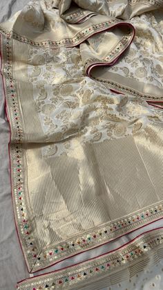 *WE  BRINGS UNIQUE AND QUALITY PRODUCTS FOR OUR CUSTOMERS* *FABRIC OF SAREE*- Pure  khaddi Georgette banarasi weaving          *Fabric of blouse_* - Pure   Khaddi Georgette            *WORK* - zari & marodi & sequins border . Occasions :- This Saree is Specially design for wedding, Party and Festive Season of indian women's wear. You can wear it on different occasions such as traditional functions, parties, family gatherings, weddings, haldi ceremony, etc Blouse stitching available with an extra Semi-stitched Traditional Wear With Border For Wedding, White Art Silk Dupatta With Zari Weaving, Unstitched Banarasi Silk Traditional Wear With Embroidered Border, White Katan Silk Dupatta With Zari Work, Festive Unstitched Traditional Wear With Border, Traditional White Chanderi Pre-draped Saree, Gold Dola Silk Dupatta For Traditional Ceremonies, Festive Pre-draped Saree With Border For Navratri, Bollywood Style Festive Pre-draped Saree With Border