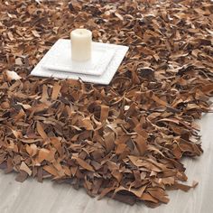 The warmth and dimension of genuine Leather Shag rugs from Safavieh. Pile height is 2.50 inches. Shag Wall, Leather Scrap, Safavieh Rug, Solid Color Rug, Leather Rug, Shag Area Rug, Leather Pieces, Brown Area Rugs, Brown Rug