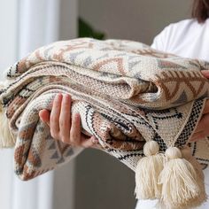 PRICES MAY VARY. 【UNIQUE DESIGN】This camel color bohemian throw blanket provides a beautifully modern tribal pattern on both the front and back. The ends of the blanket are finished with soft tassels, giving this accessory an extra touch of texture and style. 【MATERIAL & SIZE】Made of acrylic fiber, which is warm and cozy to touch. The decorative woven throw blanket is suitable for all seasons and takeout to keep warm, measures 40x60 inches. 【HIGH QUALITY】The farmhouse throw blanket has a very chic and trendy look, throw over a couch, chair, or bed to add a splash of color. Its soft feeling, lightness, rustic, and vintage-looking features make this throw blanket extremely functional. 【VERSATILE USAGE】Use this soft throw blanket not only to keep cozy or as a decor piece, but give away as an Boho Fur Bedding, Boho Tassel Bedding, Tan Blanket Bed, Throw Blanket Pottery Barn, White Bedding Brown Blanket, Amber Interiors Throw Blanket, Modern Western Boho Bedding, Boho Pottery Barn, Two Throws On Bed