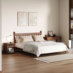 a bed sitting in a bedroom on top of a hard wood floor next to a book shelf